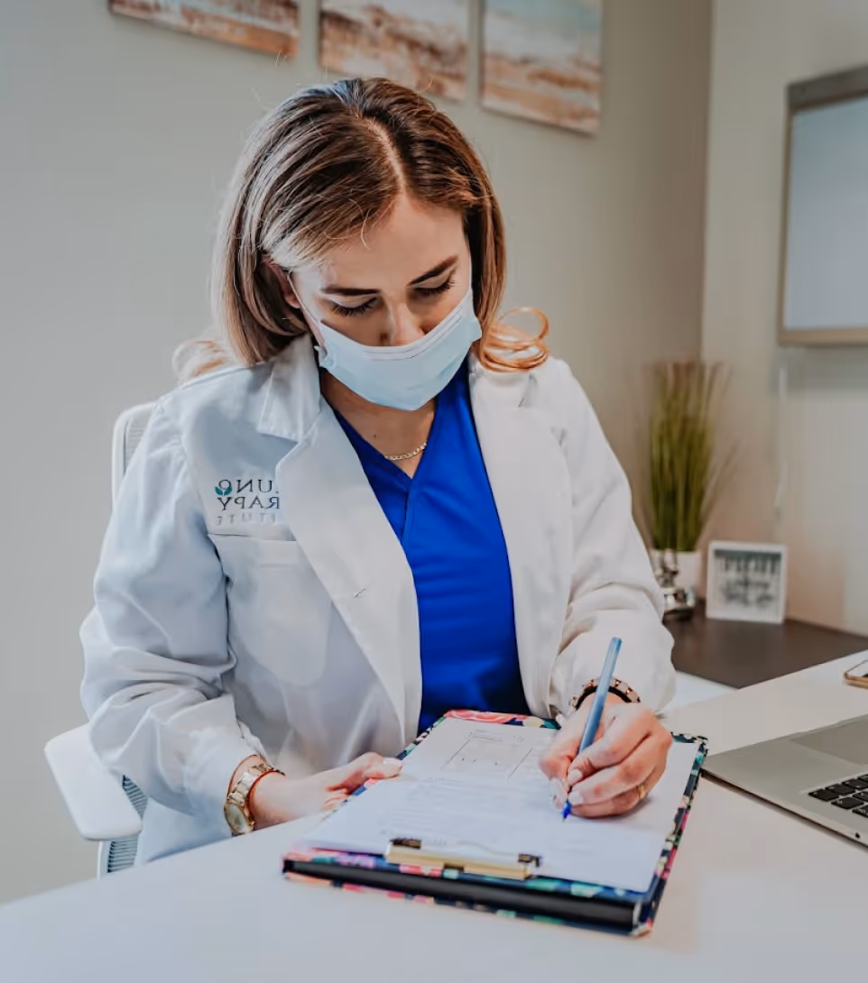 Doctor reviewing treatment plans
